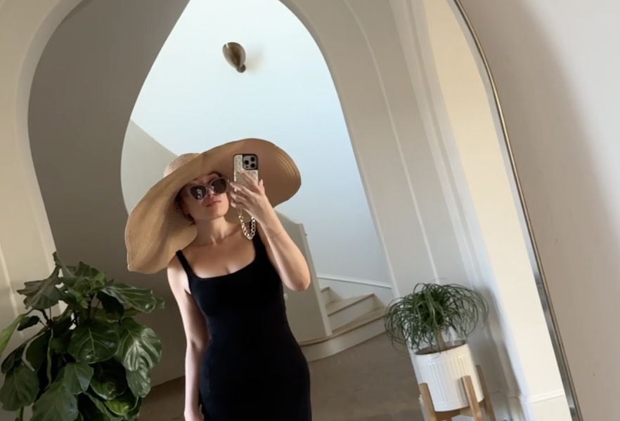 blogilates cassey ho wearing popflex hourglass maxi dress with sun hat beach outfit