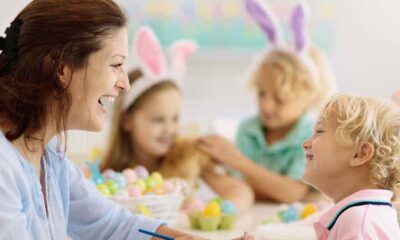 mom and son doing easter basket decorations