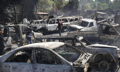 Police in Haiti say 2 men were hacked to death by a mob who thought they were buying ammo for gangs