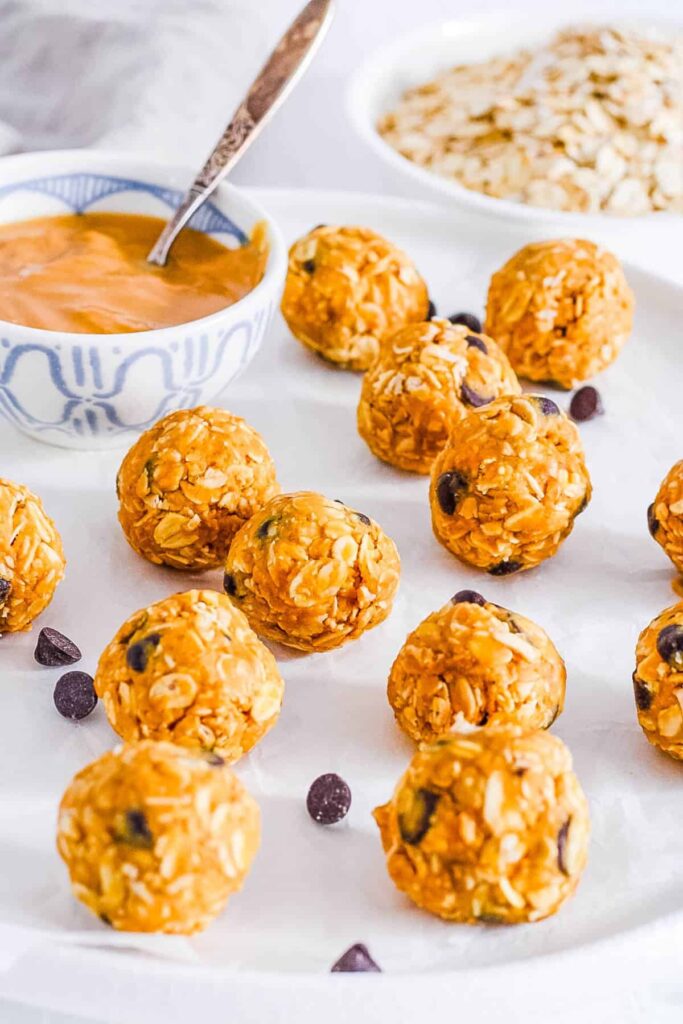 no bake peanut butter bliss balls on a white platter