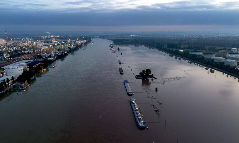 Body of a 5th victim is recovered from a submerged car after flooding in Germany