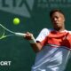 Wimbledon qualifying: Jay Clarke beats Diego Schwartzman to reach second round