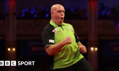 World Matchplay: Michael van Gerwen fights back against Andrew Gilding to reach semi-finals