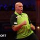 World Matchplay: Michael van Gerwen fights back against Andrew Gilding to reach semi-finals