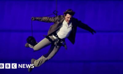 Tom Cruise abseils off stadium roof in daring Olympic finale