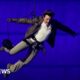 Tom Cruise abseils off stadium roof in daring Olympic finale