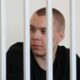 Russian man jailed for burning Koran charged with treason