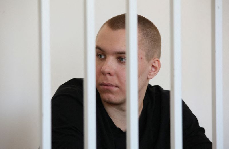 Russian man jailed for burning Koran charged with treason