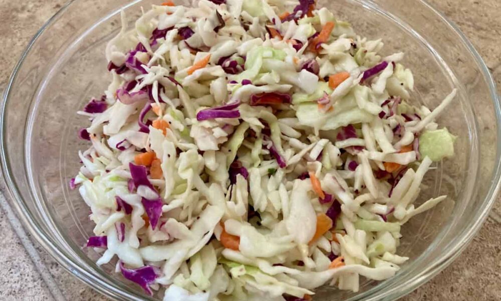 Skinny 2-Ingredient Coleslaw in glass bowl.